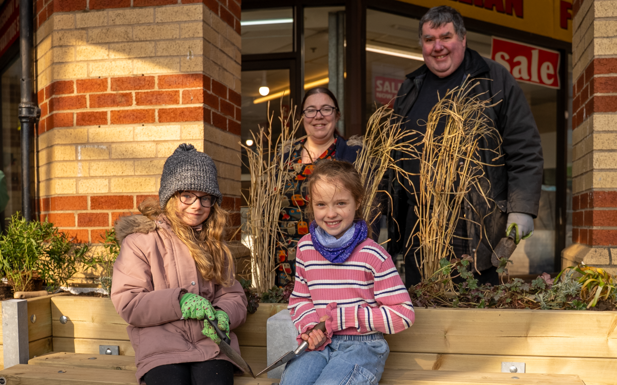 Cllr Kimberly Barrett and Rev Canon Bob White with local children at the Fratton Bridge planting event