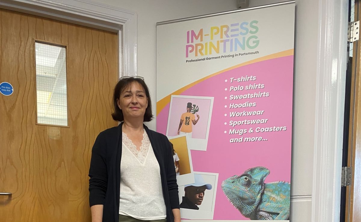 Business owner Janine with pet Labrador